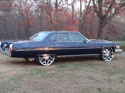 1975 cadillac deville base sedan 4-door 8.2l with 26 inch wheels