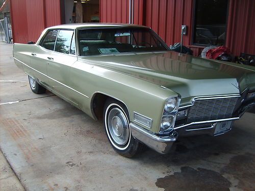 Two1968 cadillacs