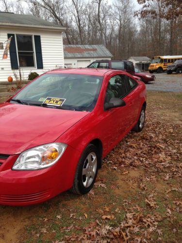 2006 chevy cobalt, red w/ grey interior,