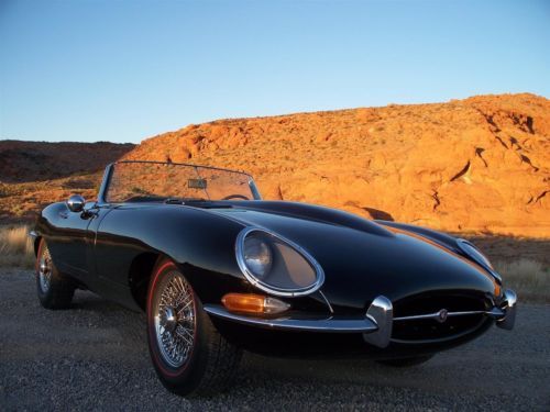 1966 black jaguar e-type roadster. restored better than new.