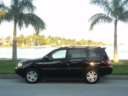 2006 toyota highlander hybrid one owner non smoker 3ed  row clean no reserve!!!