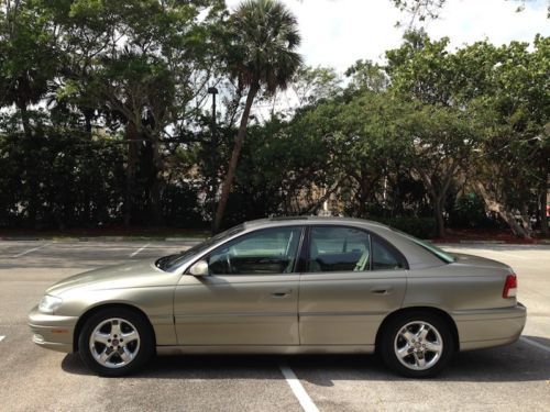 Cadillac catera low miles clean carfax sunroof bose chrome wheels books records