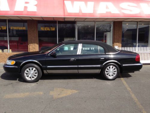 2002 black on black lincoln continental with soft top 82k miles super clean