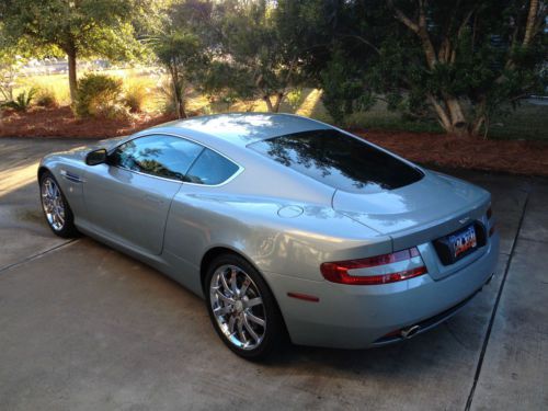 2005 aston martin db9 6.0l v12 6spd - snow shadow grey over iron ore red