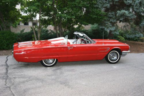 Absolutely gorgeous red thunderbird convertible w roadmaster tonneau cover