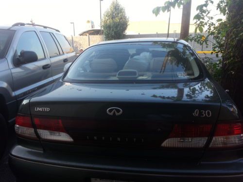 1999 infinity i30, fully loaded, 70,000 miles, moon roof, green, beige interior