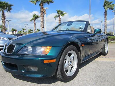 Low miles leather automatic soft top excellent shape