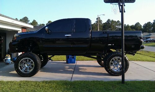 2006 nissan titan se extended cab monster lift!!