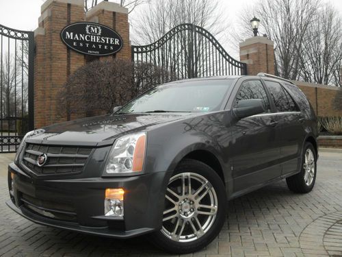 2007 cadillac srx awd sport pkg. navigation pano moonroof headrest dvd 3rd row