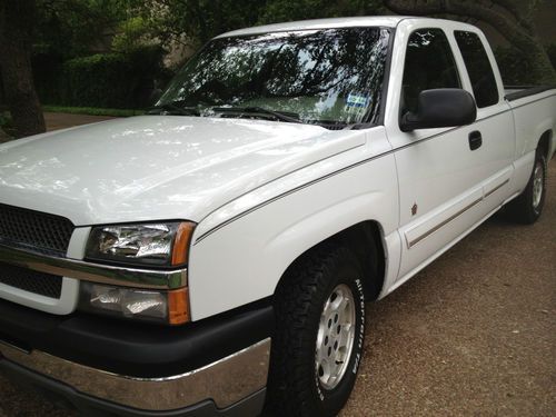 White extended cab with new tires