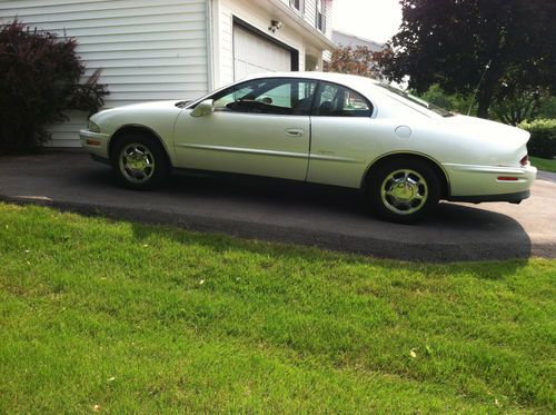 Pearl white, burgundy interior, good condition,power sunroof