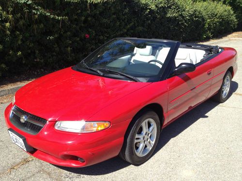 Bright red white white low mileage freshly serviced hot red hot!