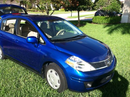 2009 nissan versa  hatchback  blue metalic paint  new motor