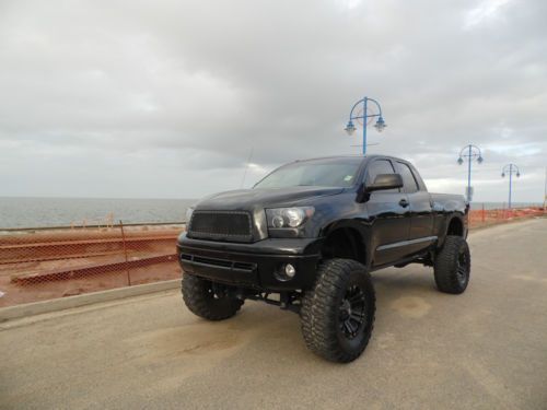 Heavily modified 2010 toyota tundra with 12&#034; lift