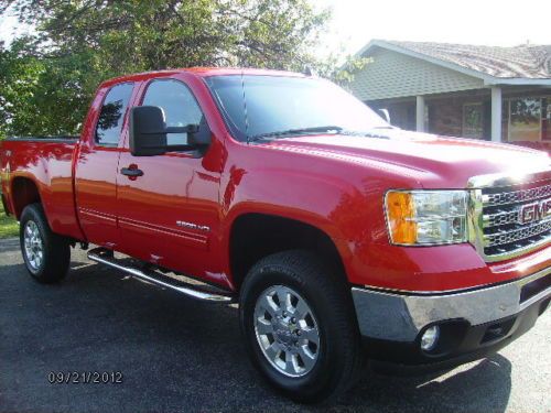 Like new 2012 gmc sle 2500 hd 4x4 ext cab  1,000 miles