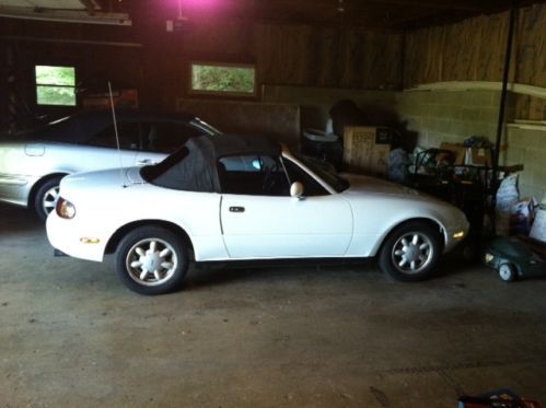 White classic miata; better than good condition; little rust