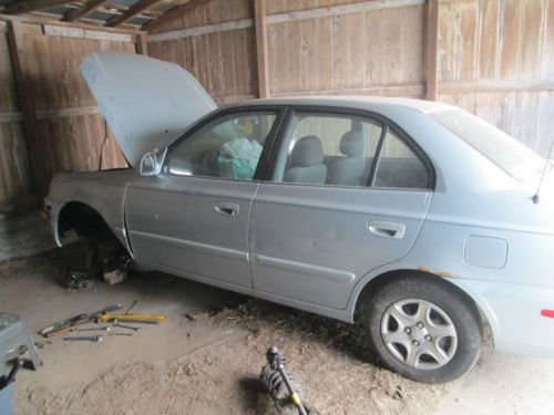 2003 hyundai accent gl sedan 4-door 1.6l  damaged suspension  220k