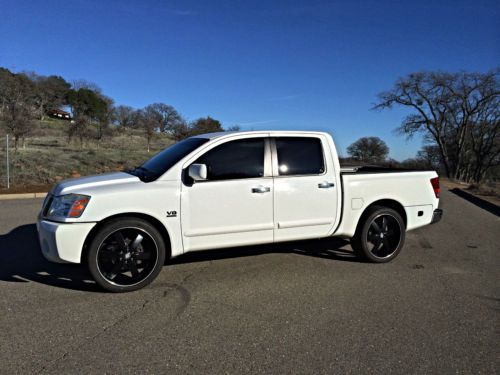 2004 nissan titan le crew cab pickup 4-door 5.6l