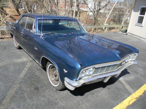 1966 chevy caprice four door hard top with a 327 under the hood