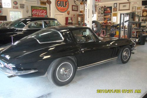 1965 chevrolet corvette black with black leather - climate controlled building