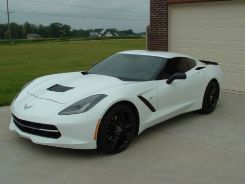 White on black, z51, black wheels, spoiler and mirrors, performance exhaust