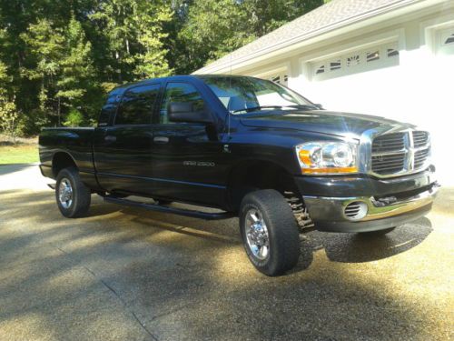 Black 2006 mega cab  4x4 , slt 117,000 miles  5th wheel rails ,brake control