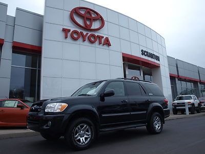 2005 limited black/tan leather, dvd, 3rd row, sun roof, running boards roof rack