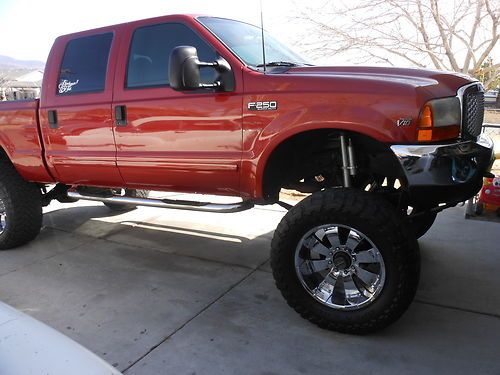 2001 ford f250 4x4 ,super duty,4 door, lifted,custom,