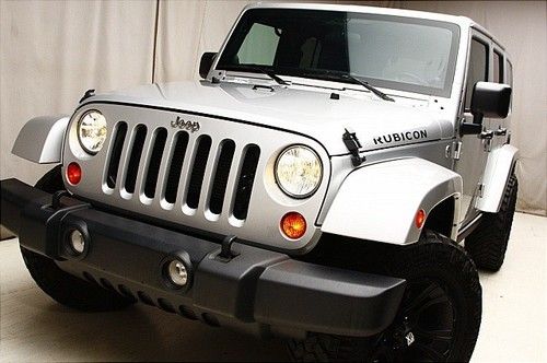 We finance!! 2012 jeep wrangler rubicon 4wd targaroof navigation towpackage