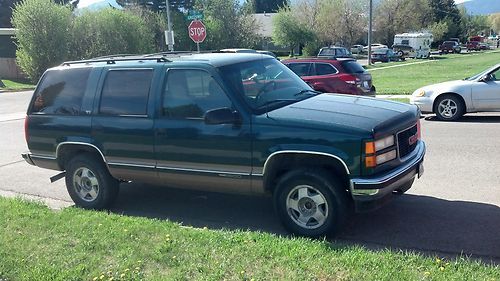 Green 1996 yukon, four-wheel-drive blown transmission, engine runs great