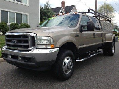 7.3l diesel 4x4 daully lariat leather carfax toolboxes ladder racks pickup truck