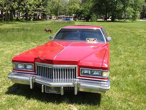 1975 cadillac coupedeville 85000 miles solid complete.500ci.power everything.red