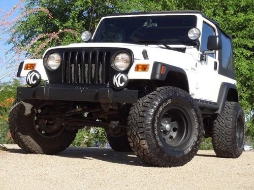 No reserve 05 jeep wrangler sport 4.0 liter automatic lifted !!!!