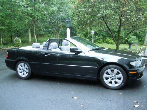 Bmw convertible 325ci sapphire black metallic with wind deflector