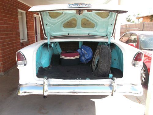 A 1955 chevy 210 sedan in good original condition for just a few thousand!