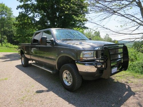2004 ford f350, diesel, stick shift, crew cab, 8ft bed, looks new
