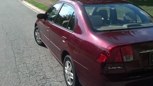 2003 honda civic lx sedan 4-door 1.7l; car runs excellent, strong and smooth