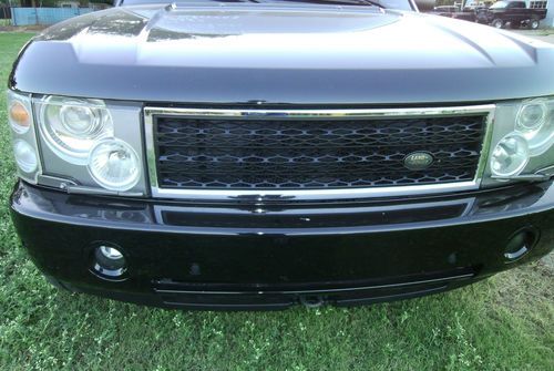 Blacked out range rover on 22's