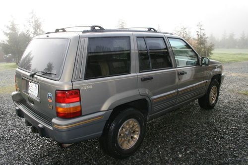 Stunning 1995 grand cherokee limited v8 / leather / 6 disc cd / sun roof ......