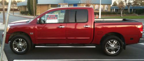 2004 nissan titan le crew cab pickup 4-door 5.6l 96,500 miles