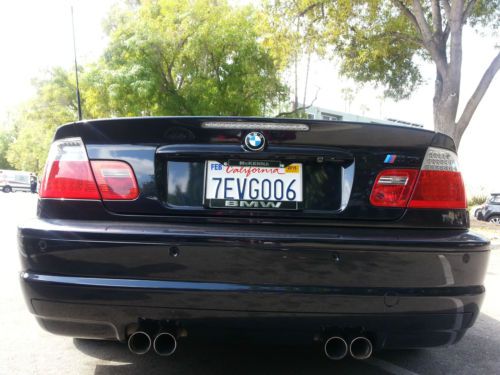 Clean navy blue convertible bmw m3 with smg transmission. rag top is excellent.