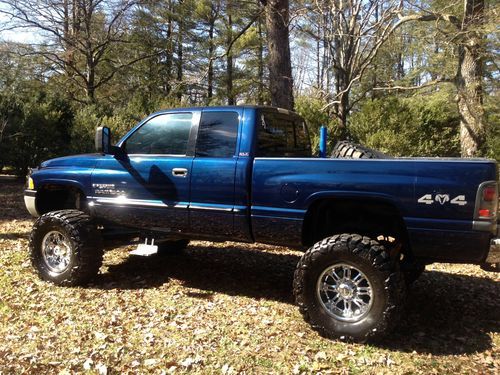 Lifted 2000 dodge ram 1500 10 inch lift/ 38 inch mud grapplers