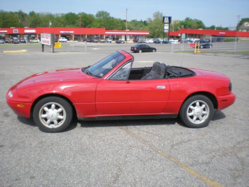 1991 madza miata, low mileage, red with power windows and removable hardtop