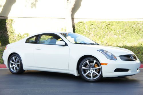 18k miles 1-owner g35 6mt sport &amp; premium package bose .. smells brand new!!