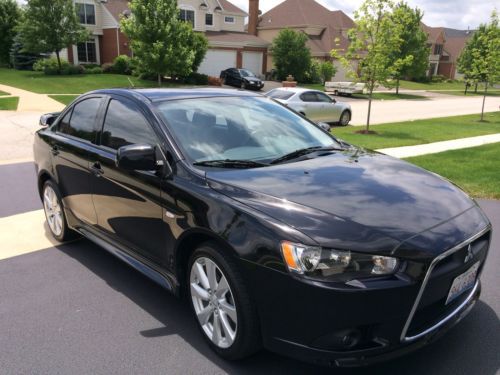 Like new 2014 mitsubishi lancer gt - black with 10437 miles. 2.0 liter, 5 speed