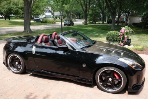 Magazine featured 2005 black 6mt nissan 350z turbo convertible, 11,603 miles!