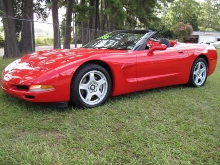 Corvette convertible, 17k original miles. red with black interior, auto trans