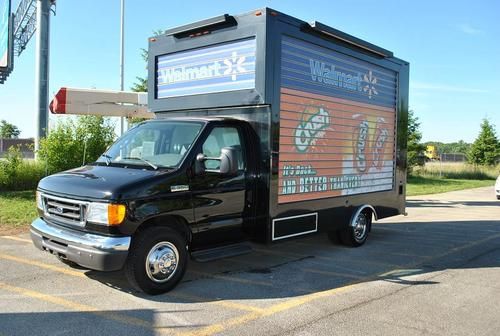 2007 ford e-350 super duty, 14' box van w/ rotating advertisement sign