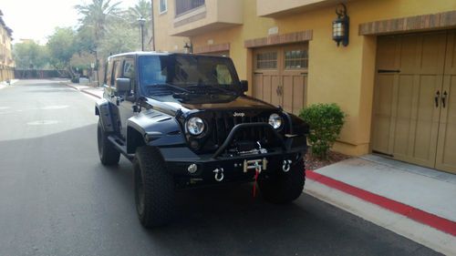2012 jeep wrangler unlimited sahara 4-door 3.6l loaded afe warn aev