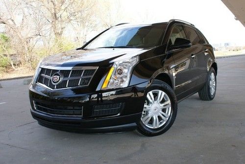 Srx luxury, low 16k miles, dvd navi, black/tan, pano, 2.95% apr financing!